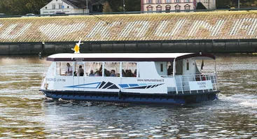 Naujiena-pasiplaukiojimas laivu Kaunas žemyn Nemunu su istoriku Gediminu